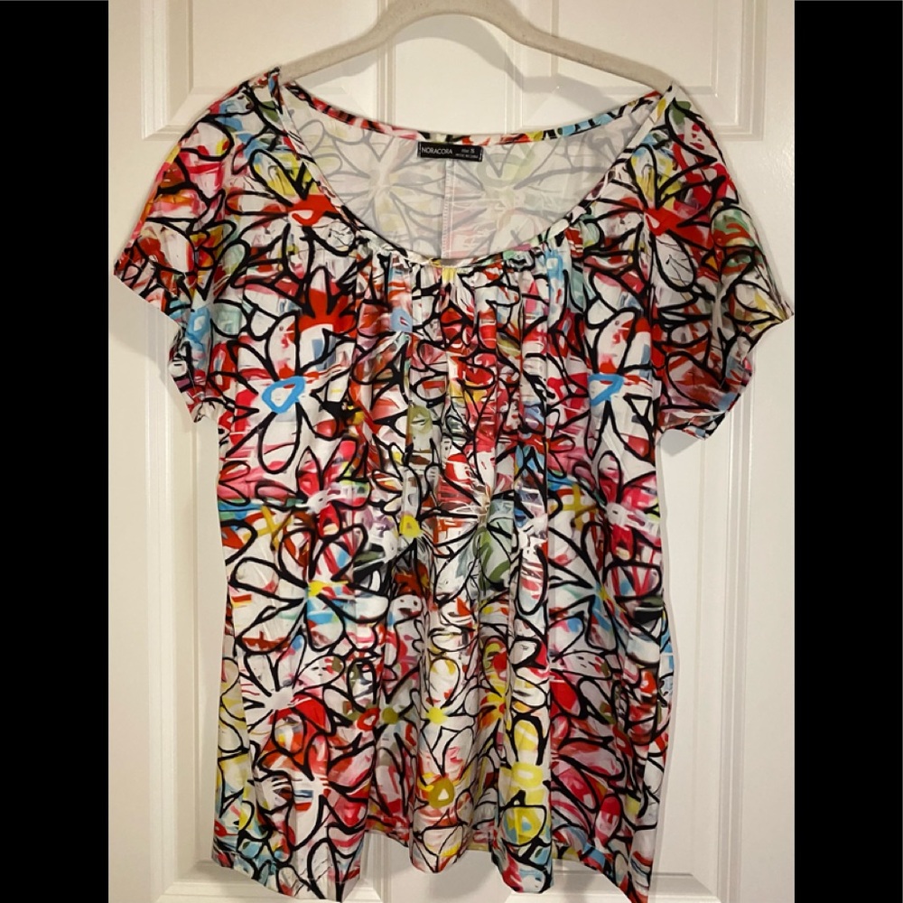 NWOT Noracora colorful cotton/poly shirt sleeve flowy top.